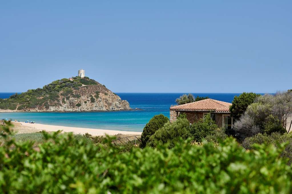 Baia Chia Laguna Resort, Curio Collection by Hilton